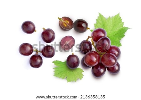 Red grapes with green leaves and half sliced isolated on white background. Top view. Flat lay. Grape pattern texture background.  Royalty-Free Stock Photo #2136358135