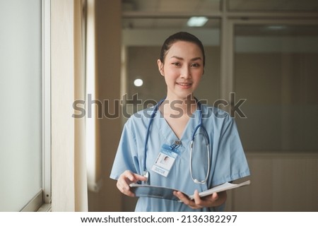 Asian Doctor woman  working in hospital for patient