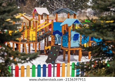 Playground In the mountain park. Winter forest and playground
