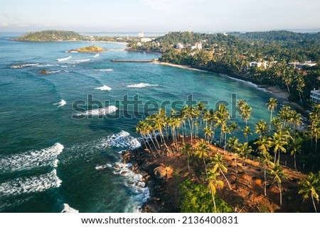 Coconut tree hill in Mirissa Beach. Sri Lanka. Royalty-Free Stock Photo #2136400831