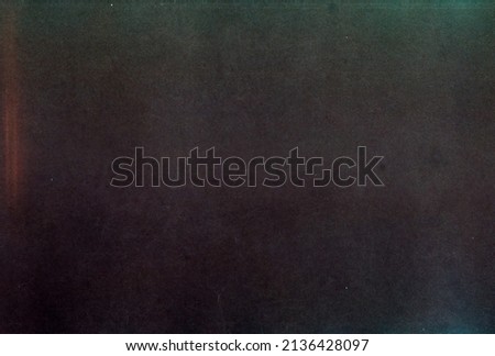 Dusty scratched and scanned old film texture Royalty-Free Stock Photo #2136428097