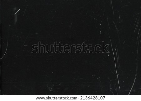 Dusty scratched and scanned old film texture Royalty-Free Stock Photo #2136428107