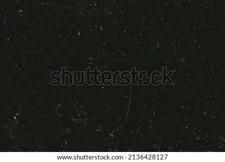 Dusty scratched and scanned old film texture Royalty-Free Stock Photo #2136428127