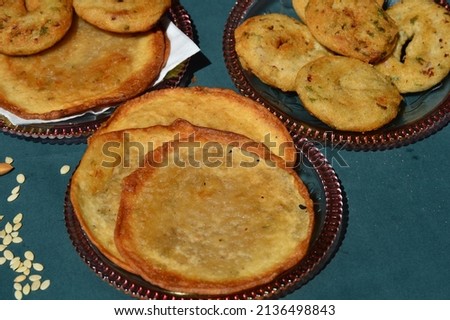 Image of babru bhalla,malpua traditional snack dishes of mandi himachal pradesh india, mark of festivals.