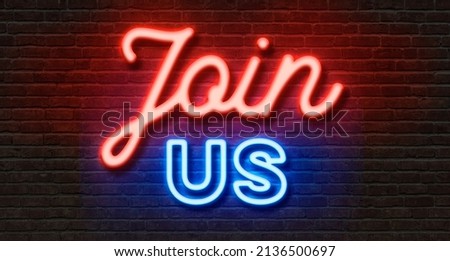 Neon sign on a brick wall - Join us