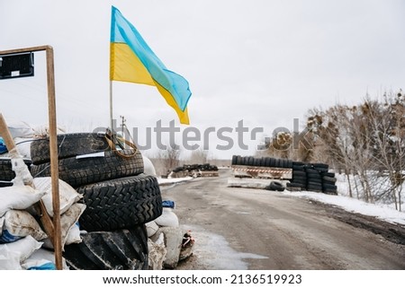 war in Ukraine. checkpoint on the road Royalty-Free Stock Photo #2136519923