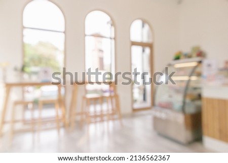 Coffee shop or cafe restaurant interior blur for background Royalty-Free Stock Photo #2136562367