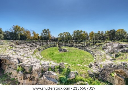 Roman amphitheater of Syracuse Sicily, inside the Neapolis archaeological park Royalty-Free Stock Photo #2136587019