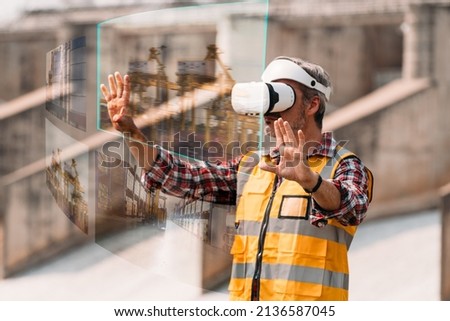 Senior engineer wearing AR goggle and browsing work area thought the virtual reallity. Technology Virtual reallity for industrial work space. Smart wearables, protopia. Royalty-Free Stock Photo #2136587045