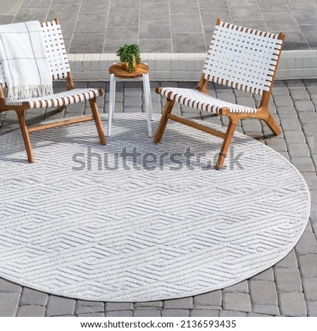 Stylish modern outdoor carpet design.
