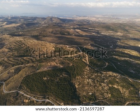Cesme landscape with windmills and paths on the hills