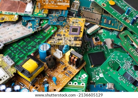 Pile of scrap electronic circuit boards for recycling Royalty-Free Stock Photo #2136605129