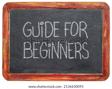 guide for beginners title handwritten with white chalk on a vintage slate blackboard Royalty-Free Stock Photo #2136630095