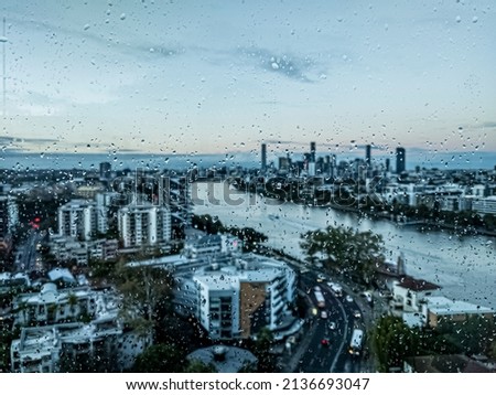 City view after rain - Rain water on window glass in Brisbane, Queensland, Australia