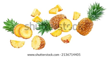 Flying Pineapple Clipping Path. Ripe whole pineapple and slice isolated on white background with clipping path. Pineapple fruit set macro studio photo Royalty-Free Stock Photo #2136714405
