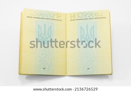 Internal passport of Ukraine isolated on white background. Isolated view of an expanded document. The document number is completely fictitious
