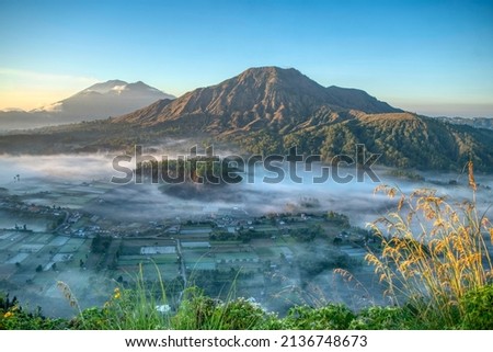 Beautiful mount batur in the morning Royalty-Free Stock Photo #2136748673