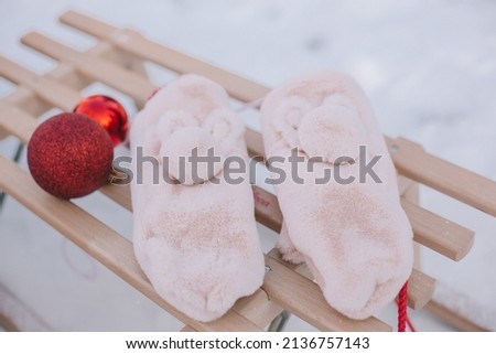 pink mittens in the winter season, winter time