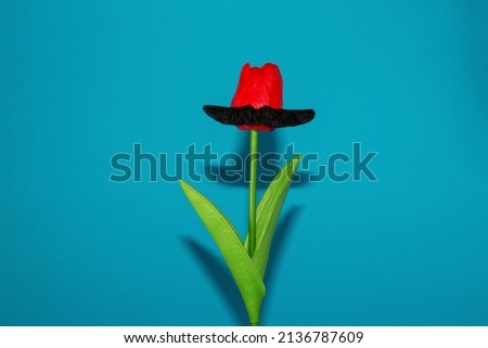 red flower with mustache, creative flower concept with beautifully arranged mustache, fashion design
