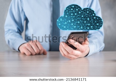 Businessman hold cloud icon.Cloud computing concept - connect smart phone to cloud. computing network information technologist with smart phone.Big data Concept.Low poly,polygonal.