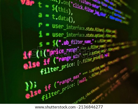 Screen of web developing javascript code. Mobile app developer. Modern web development background. Web abstract programming and created virus on laptop screen. Shallow Depth of Field effect
