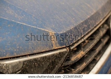 sahara sand on the varnish of a car in germany after rain Royalty-Free Stock Photo #2136858687
