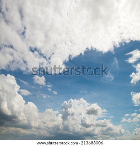The blue sky and white fluffy clouds 