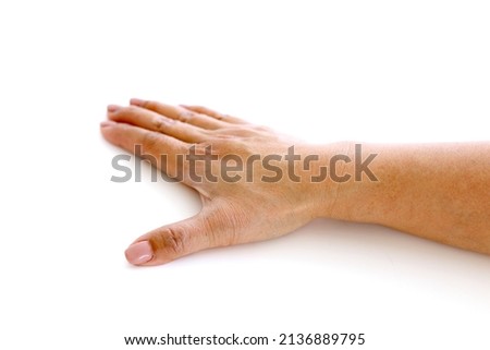 Close up woman thumb on right hand top view isolated on white background. 