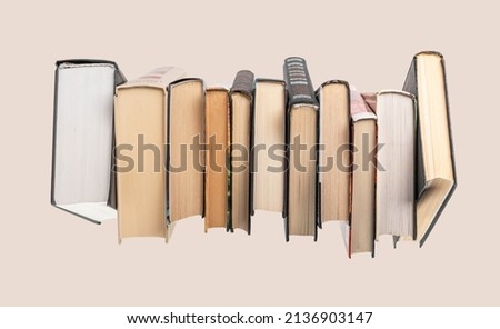 Books row. Education, reading hobby, conducting research, preparing for exams, studying new information concept. High quality photo