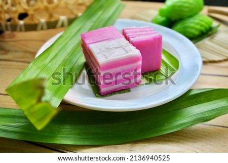 Kueh lapis is an Indonesian and Malaysian kueh, or a traditional snack of steamed colourful layered soft rice flour pudding. In Indonesian lapis means "layers"