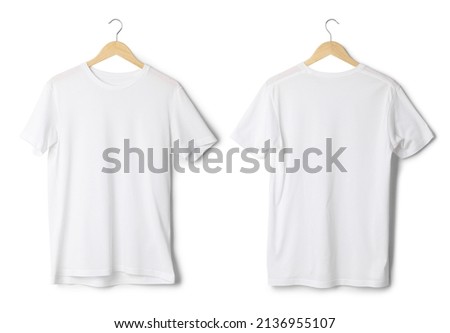 White T shirt mockup hanging isolated on white background with clipping path. Royalty-Free Stock Photo #2136955107