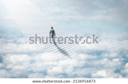 Stairway to heaven. Shot of a stairway leading up to heaven. Royalty-Free Stock Photo #2136956873