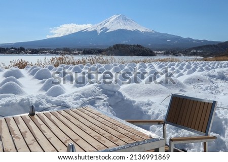 table and chairs at the foot of mt.Fuji in winter