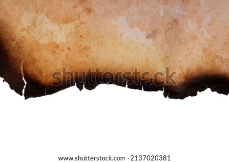 paper with burnt edges isolated on white background. High quality photo Royalty-Free Stock Photo #2137020381