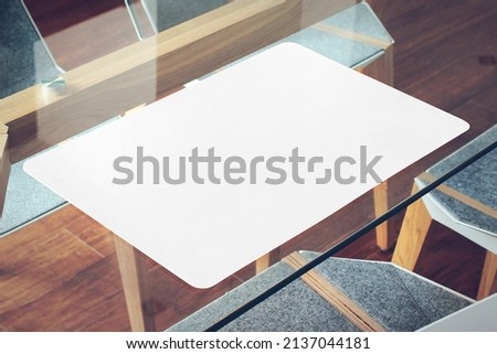 Placemat and Napkin Mockup on Table Royalty-Free Stock Photo #2137044181