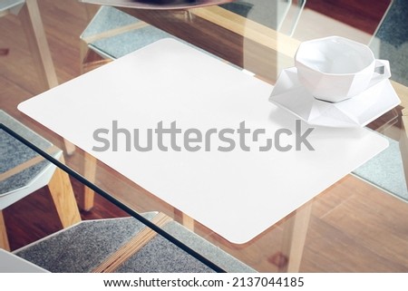 Placemat and Napkin Mockup on Table Royalty-Free Stock Photo #2137044185