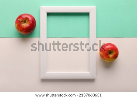 White frame on a green background, top view. Minimalism. Business plan, planning for the month. Place for the image.