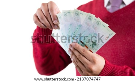 latin man colombian money, red sack, businessman or entrepreneur on white background