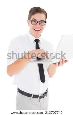 Nerdy businessman holding his laptop on white background