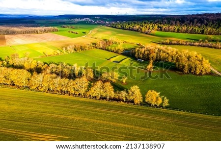 Panorama of agricultural fields landscape. Agriculture farm fields landscape. Farm land agricultural fields. Landscape of farm field Royalty-Free Stock Photo #2137138907