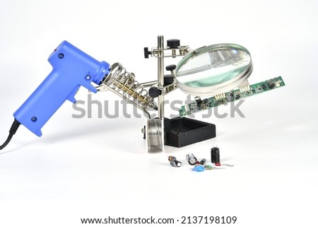 Electric Soldering Iron Stand, or Electronic circuit maintenance Royalty-Free Stock Photo #2137198109