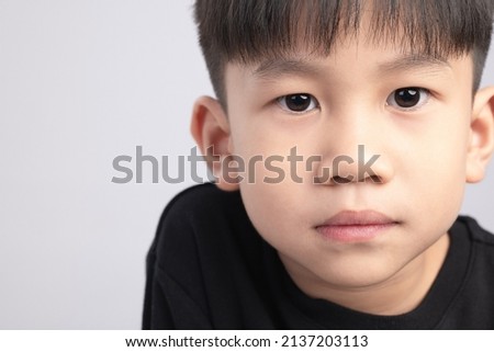 Close up picture of a 6 years old Asian boy.