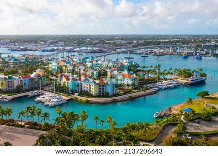 Harborside Villas aerial view at Nassau Harbour with Nassau downtown at the background, from Paradise Island, Bahamas. Royalty-Free Stock Photo #2137206643