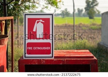 Fire Extinguisher symbol at the emergency rescue equipment station. Industrial object and symbol photo