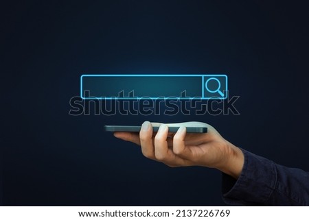 Businessman holding smartphone or mobile phone for searching data information networking. Concept for network web and technology