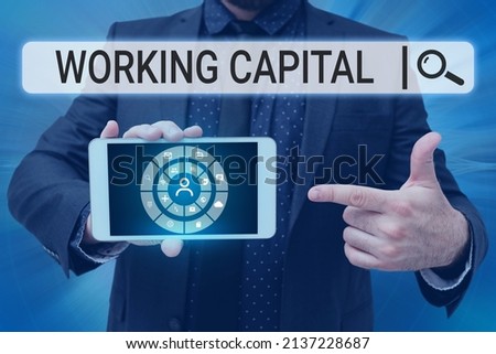 Conceptual caption Working Capital. Conceptual photo Working Capital Man holding Screen Of Mobile Phone Showing The Futuristic Technology.