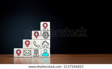 communication Connect all areas with internet network which is printed on a wooden cube block on the house and office, phone, internet and mail icons,Creative concept of communication without borders 