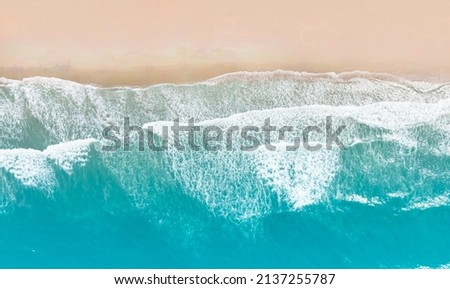 Aerial  top view of  the beach wave on tropical sea in summer background