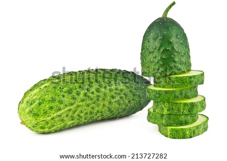 One young whole cucumber and five slices on white background