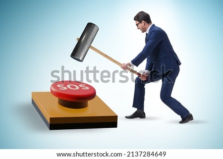 Businessman pressing SOS button in case of danger